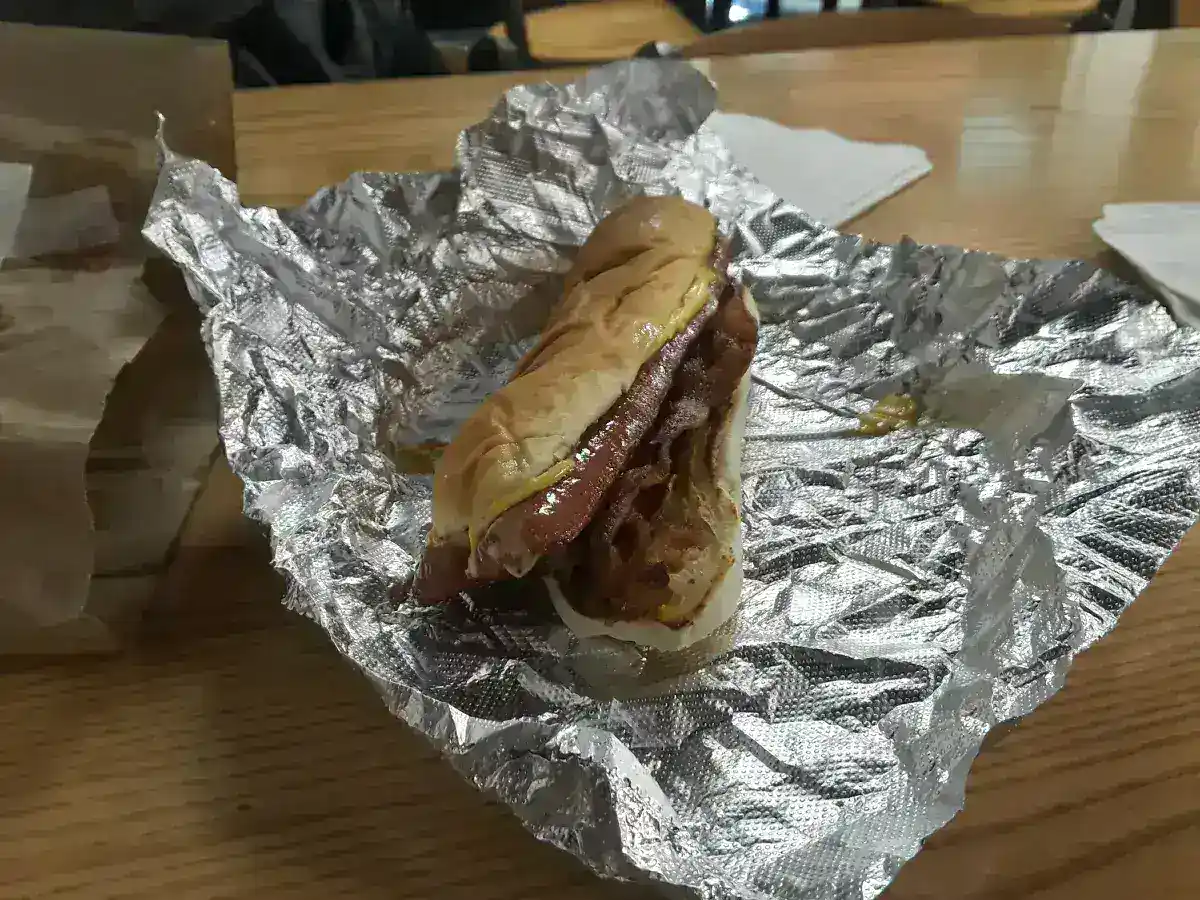 A loaded hot dog with ketchup and mustard from Five Guys — proof this duo works on everything